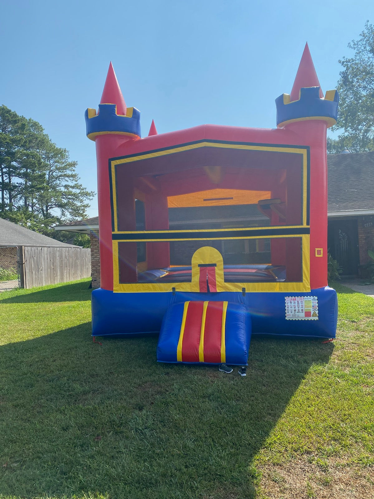 Primary colors castle jumper with basketball hoop